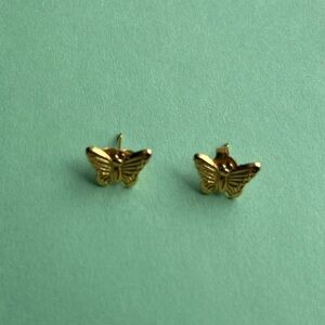 Set of gold butterfly earrings